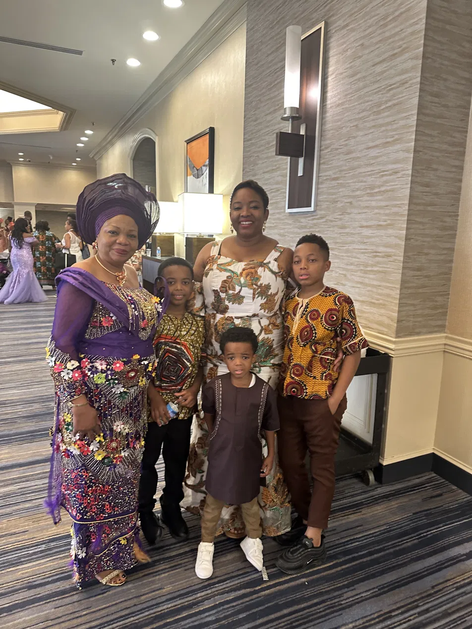 A Ngwa family with children dressed for a community event in Dallas–Fort Worth.